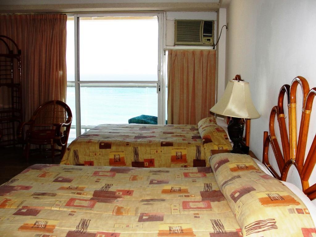 Salvia Cancun Aparts Quarto foto
